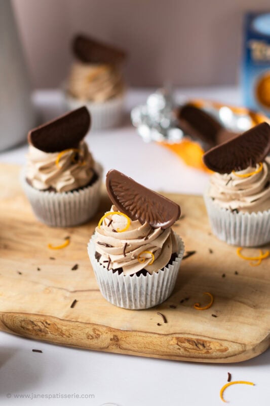 A close up of three Chocolate Orange Cupcakes