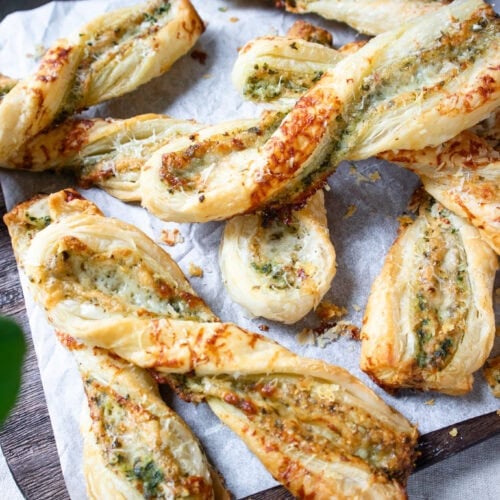 Flakey Pesto and Cheese Straws piled on top of one another