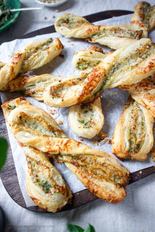 Flakey Pesto and Cheese Straws piled on top of one another