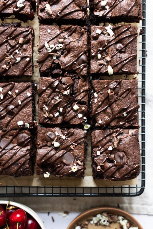 The bottom right corner of a tray of black forest brownies