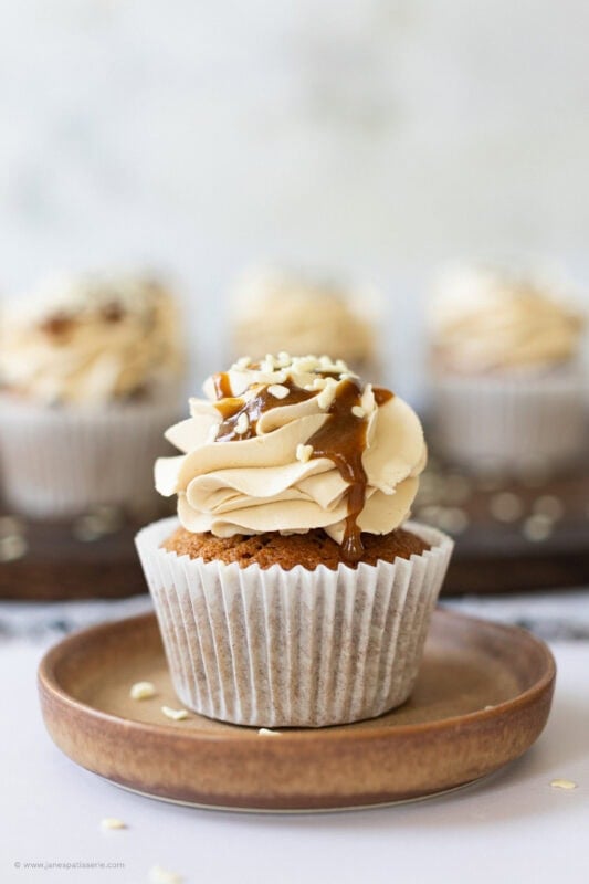 A butterscotch cupcake on a plate