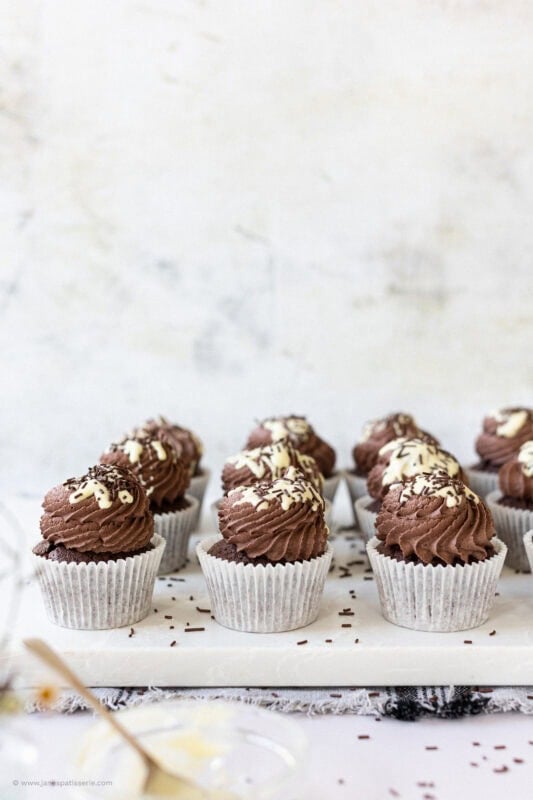 A tray of Chocolate Cupcakes in white cases