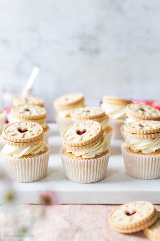 A row of decorated Jammie Dodger Cupcakes