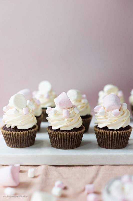 A side angle of a row of marshmallow cupcakes