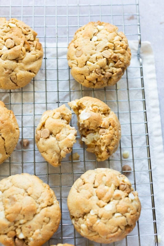 A broken Peanut Butter NYC Cookies on a cooling tray