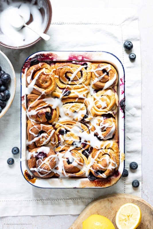 A tray of lemon and blueberry rolls