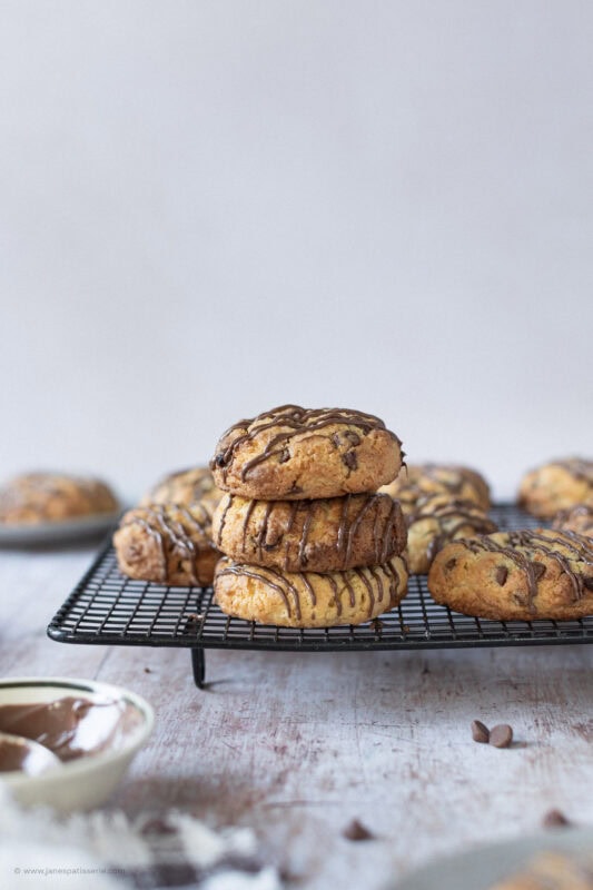 A stack of Coconut Chocolate Rocks on a cooling rack
