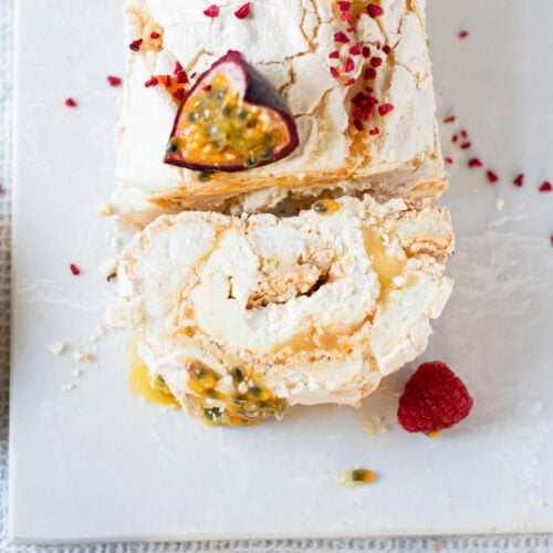 A cut lemon meringue roulade
