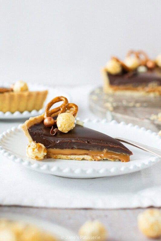 A side angle of a slice of Salted Caramel Tart