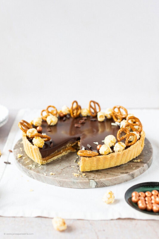 A shot of a missing slice of Salted Caramel Tart