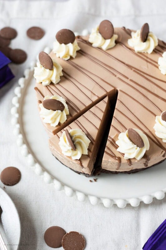 A slice cut into the Cadbury's chocolate cheesecake