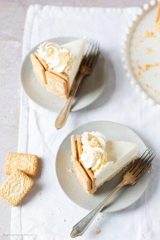 Slices of Custard cream cheesecake on plates