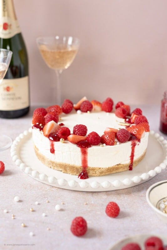 A champagne cheesecake with strawberries and champagne