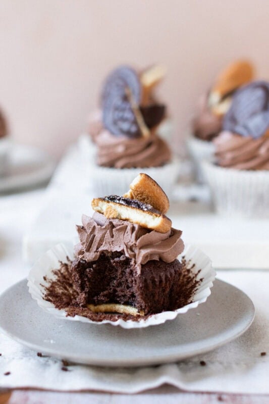 A bite missing from a Jaffa Cake Cupcake