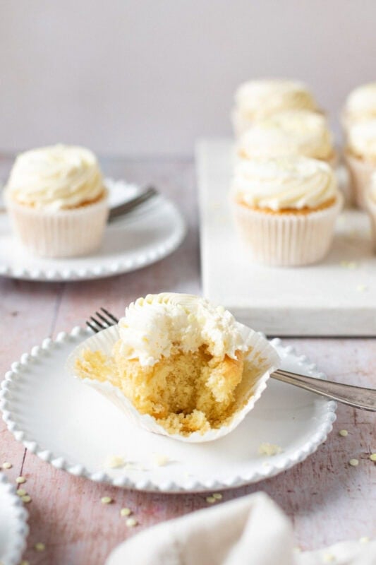 A bite missing from a Lemon Drizzle Cupcake