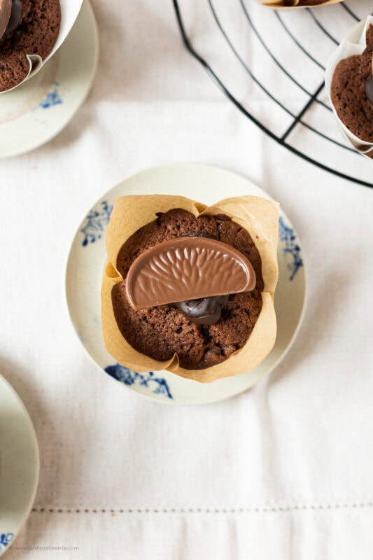 Bidseye shot of. a Chocolate Orange Muffin on a plate