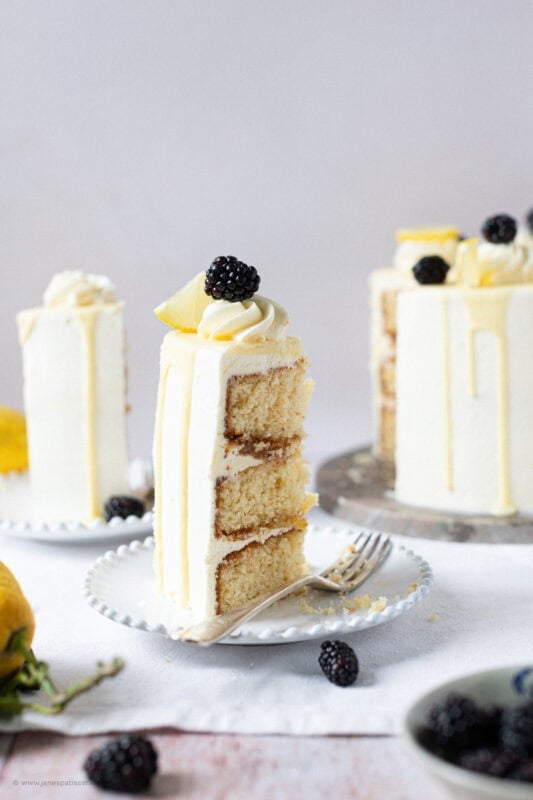 A bite missing from a Lemon Elderflower Cake slice