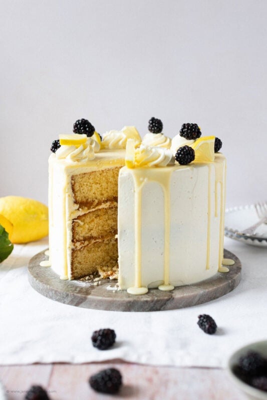 A slice missing from a Lemon Elderflower Cake